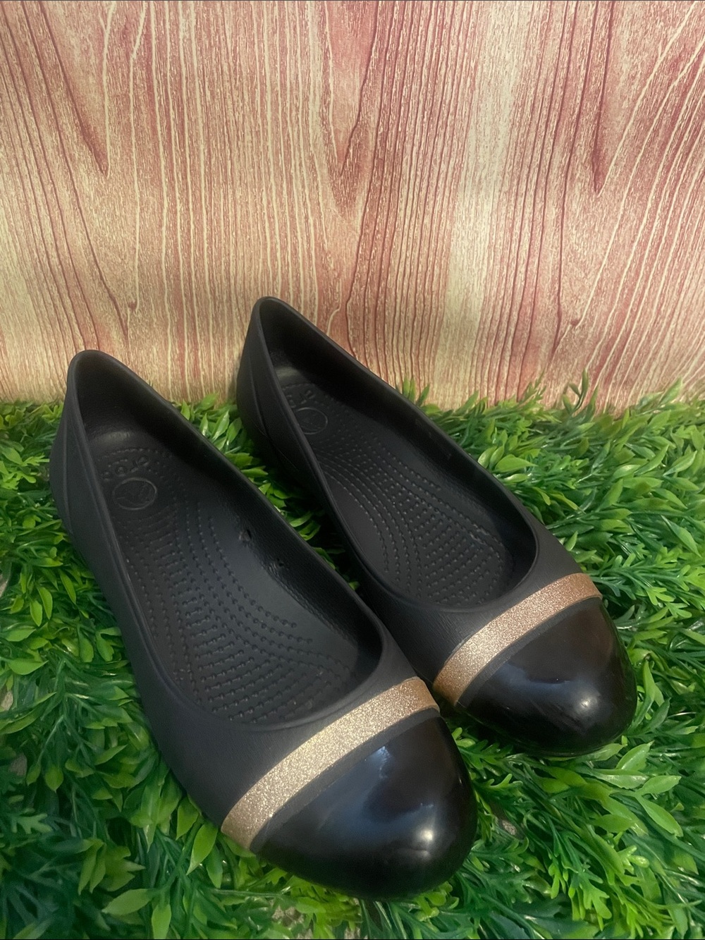 CROCS Women’s Black Flats with Gold Toe Band